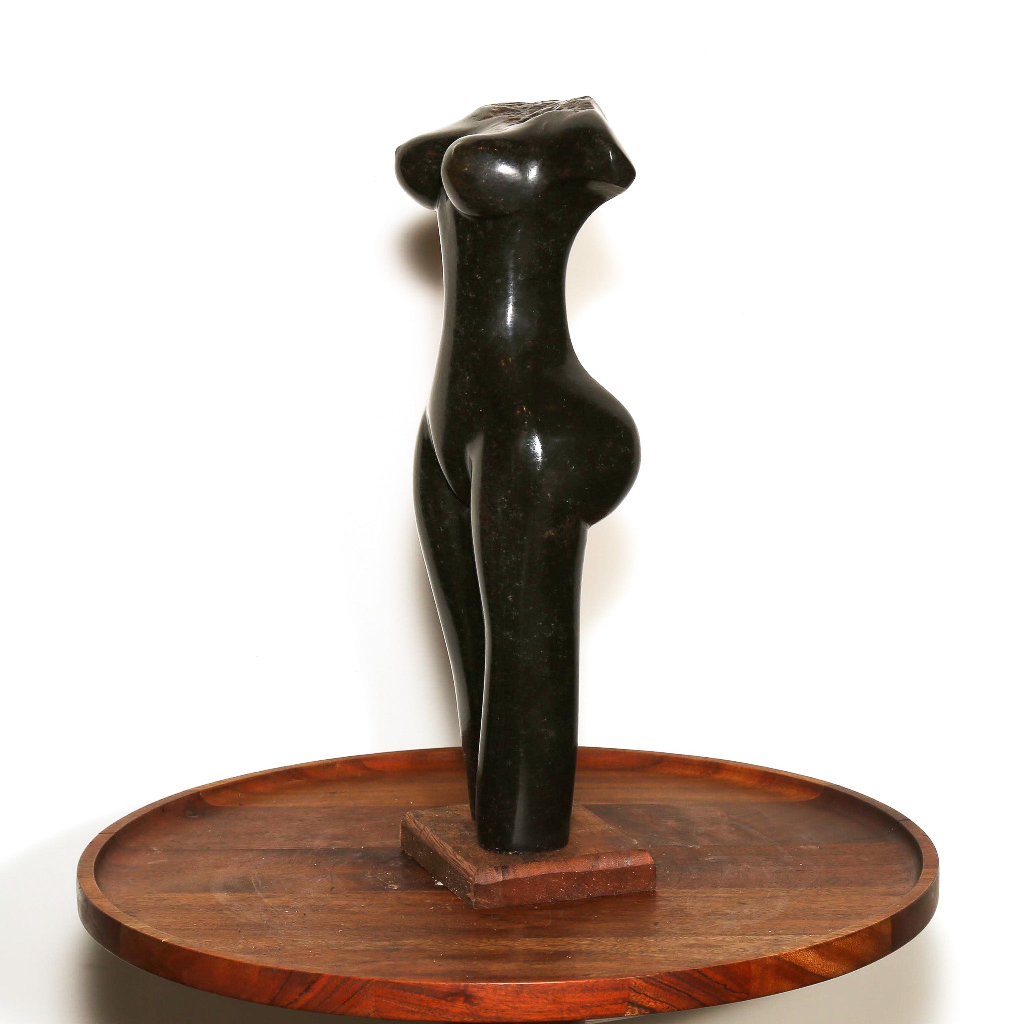 side table display sculpture of a woman