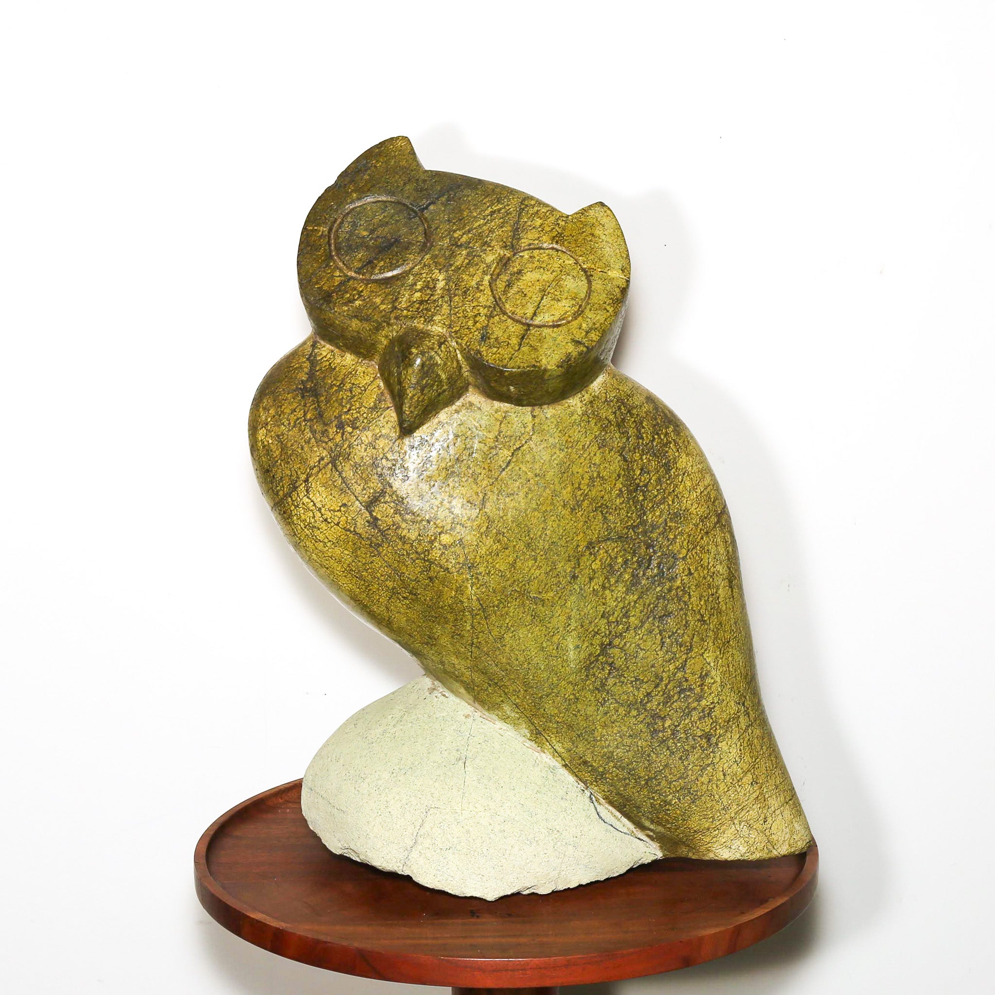 yellow hand made African sculpture