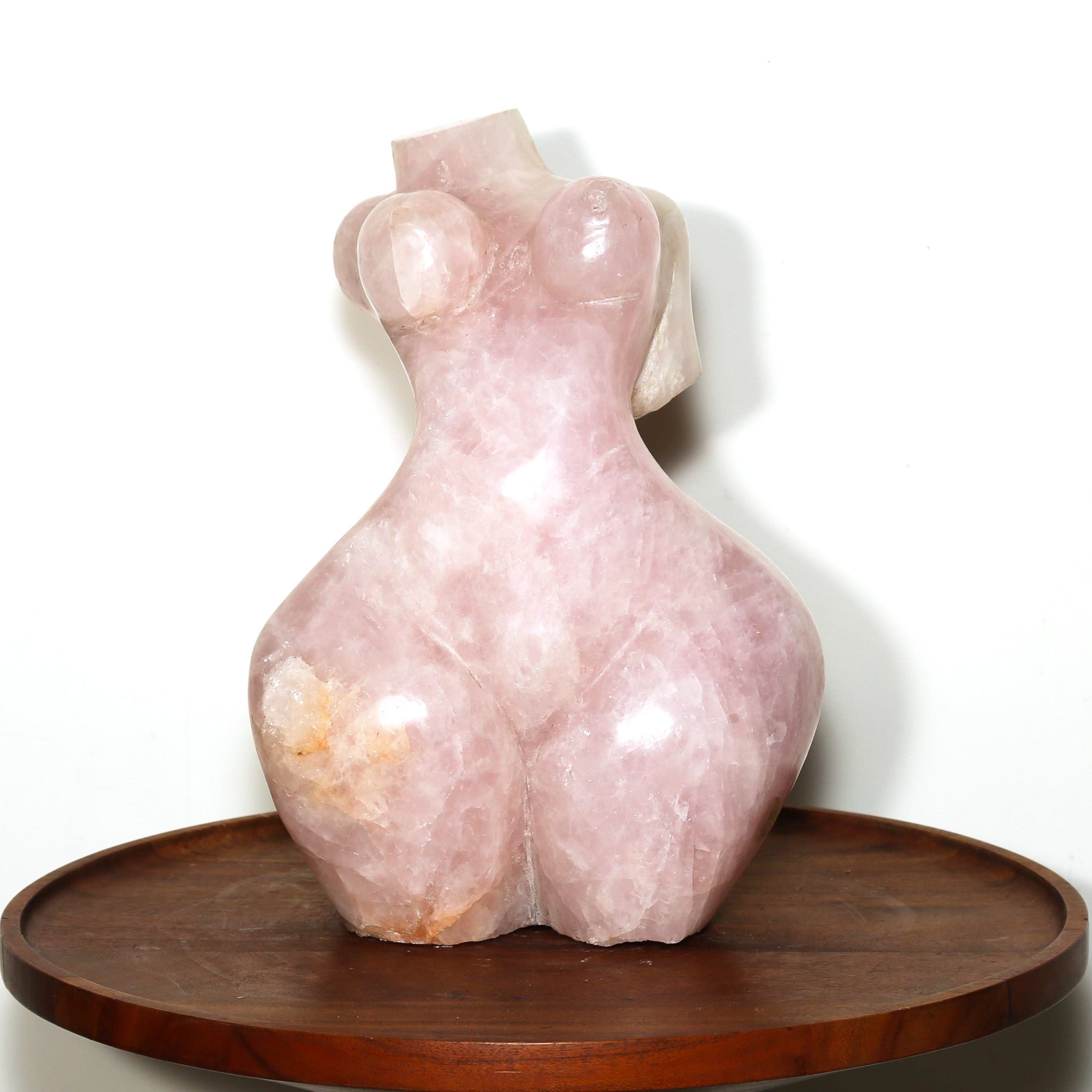 pink sculpture of a woman