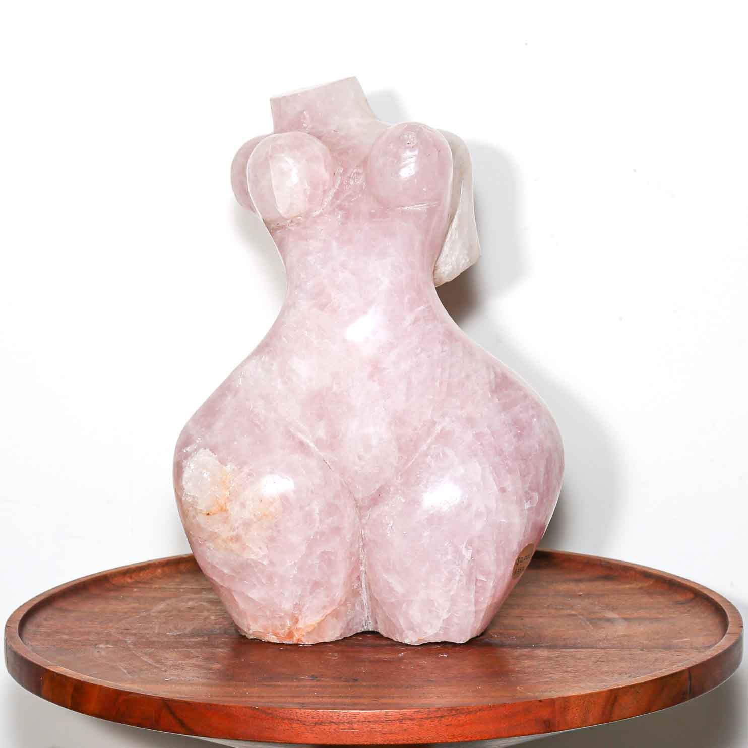 pink sculpture of a woman