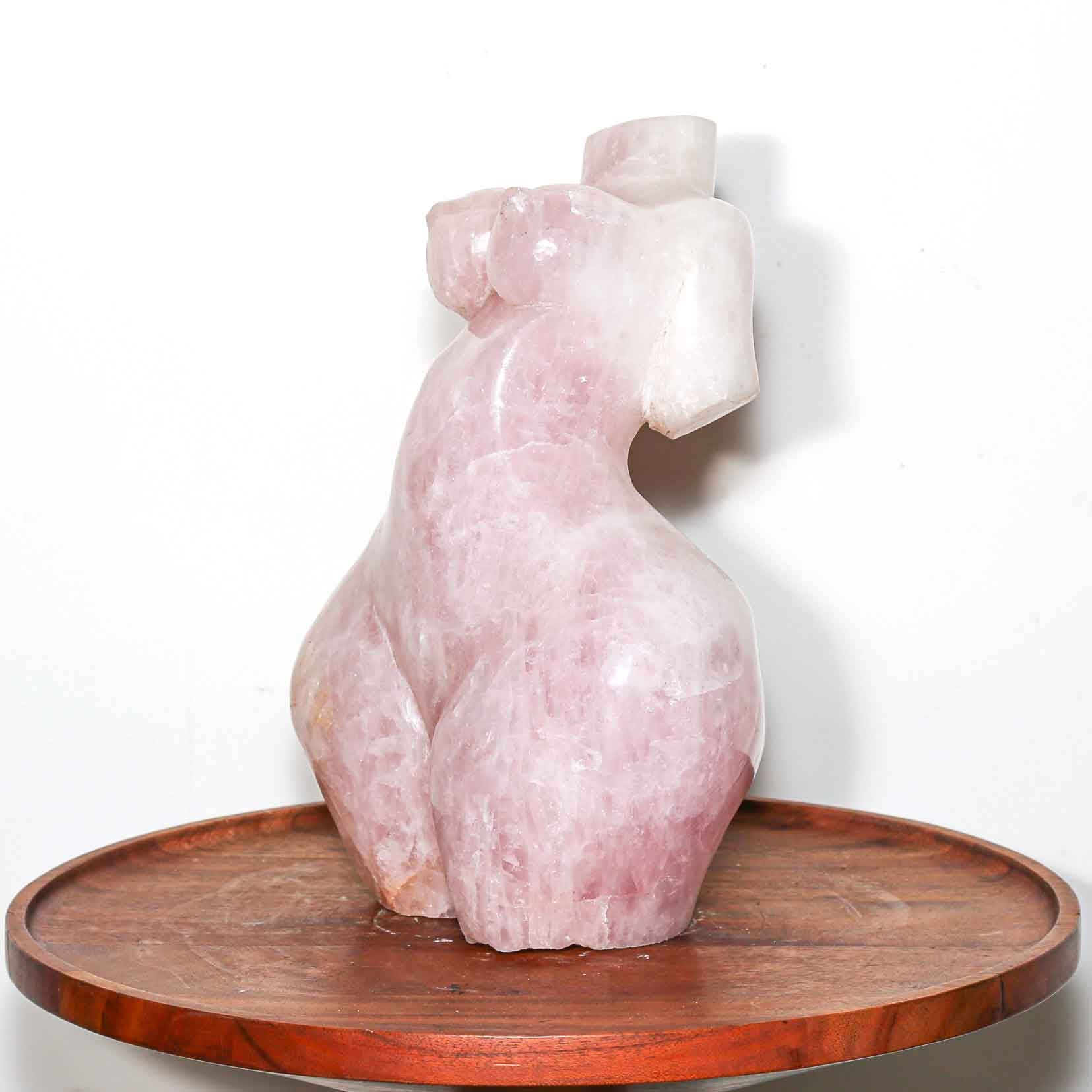 pink sculpture of a woman