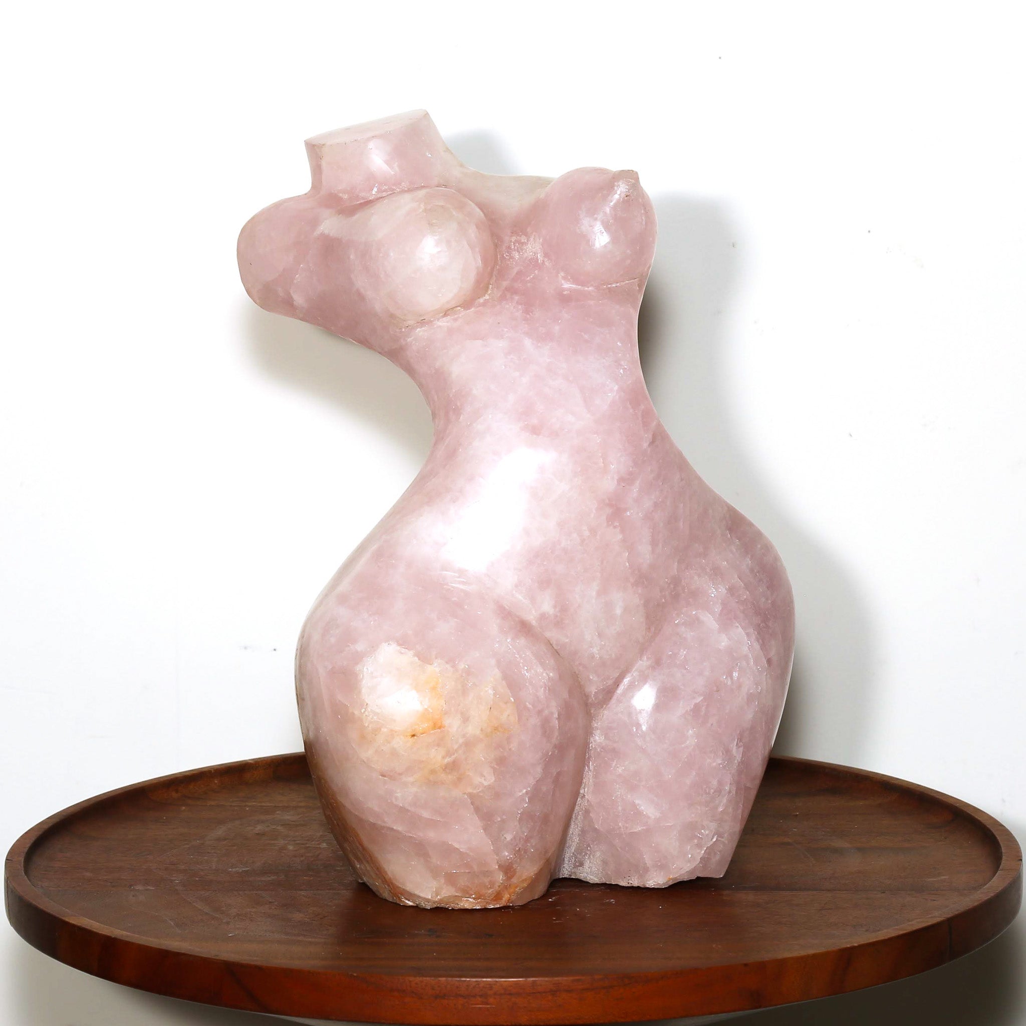 Sculpture of a woman in rose marble