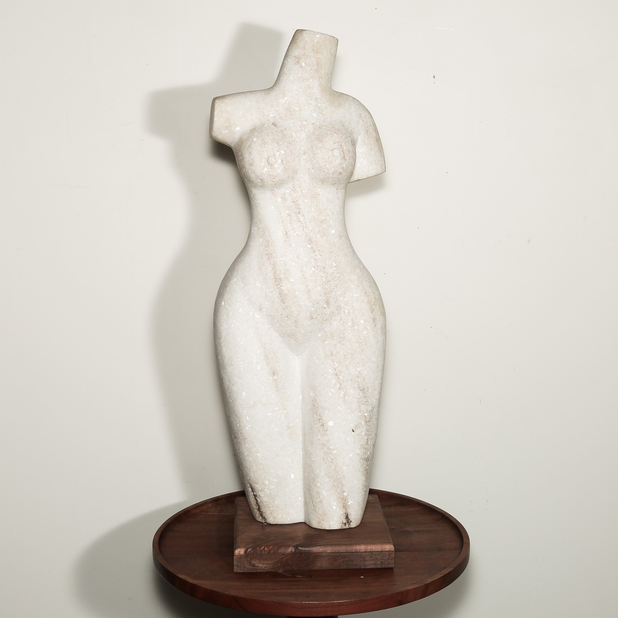 white stone statue of a woman