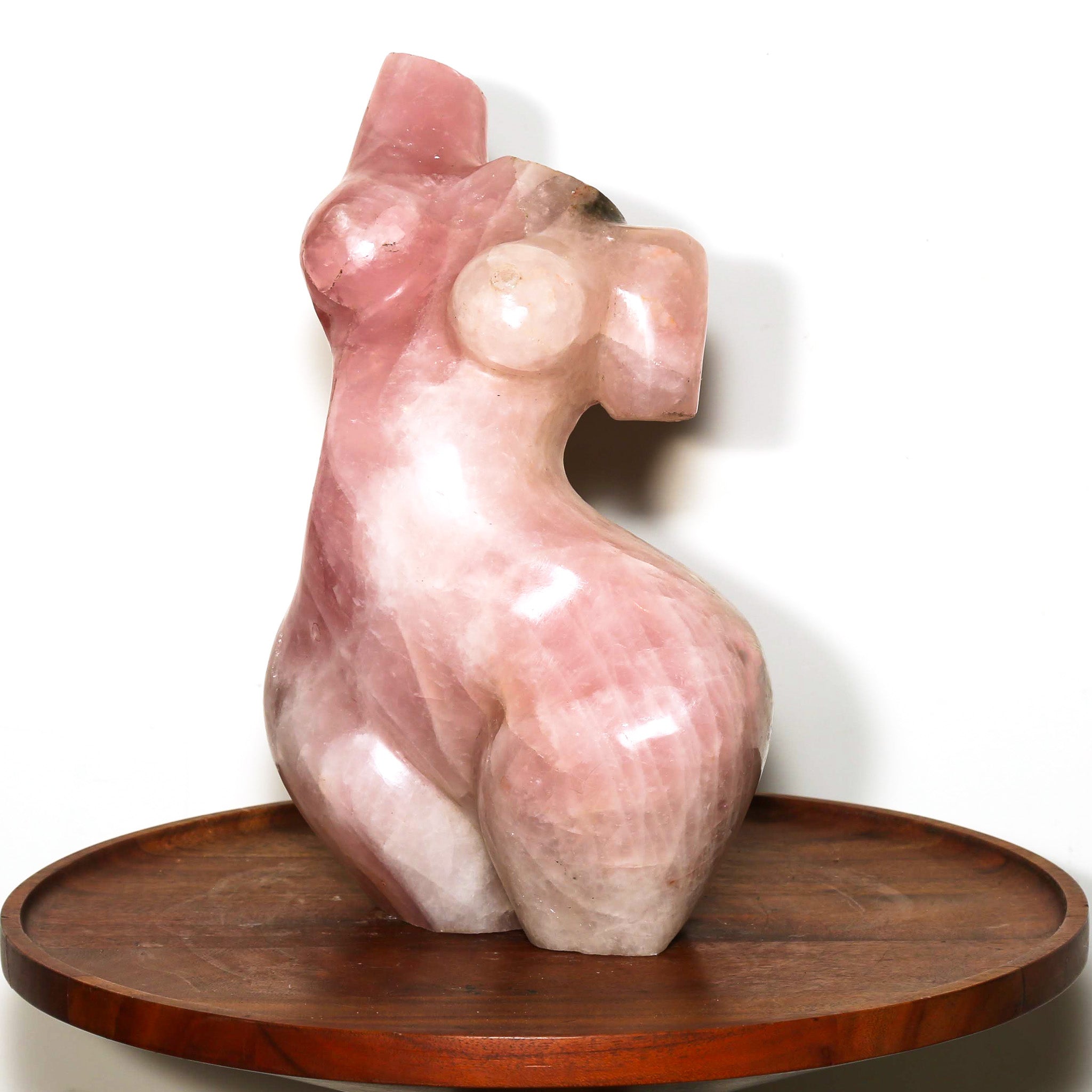 pink sculpture of a woman