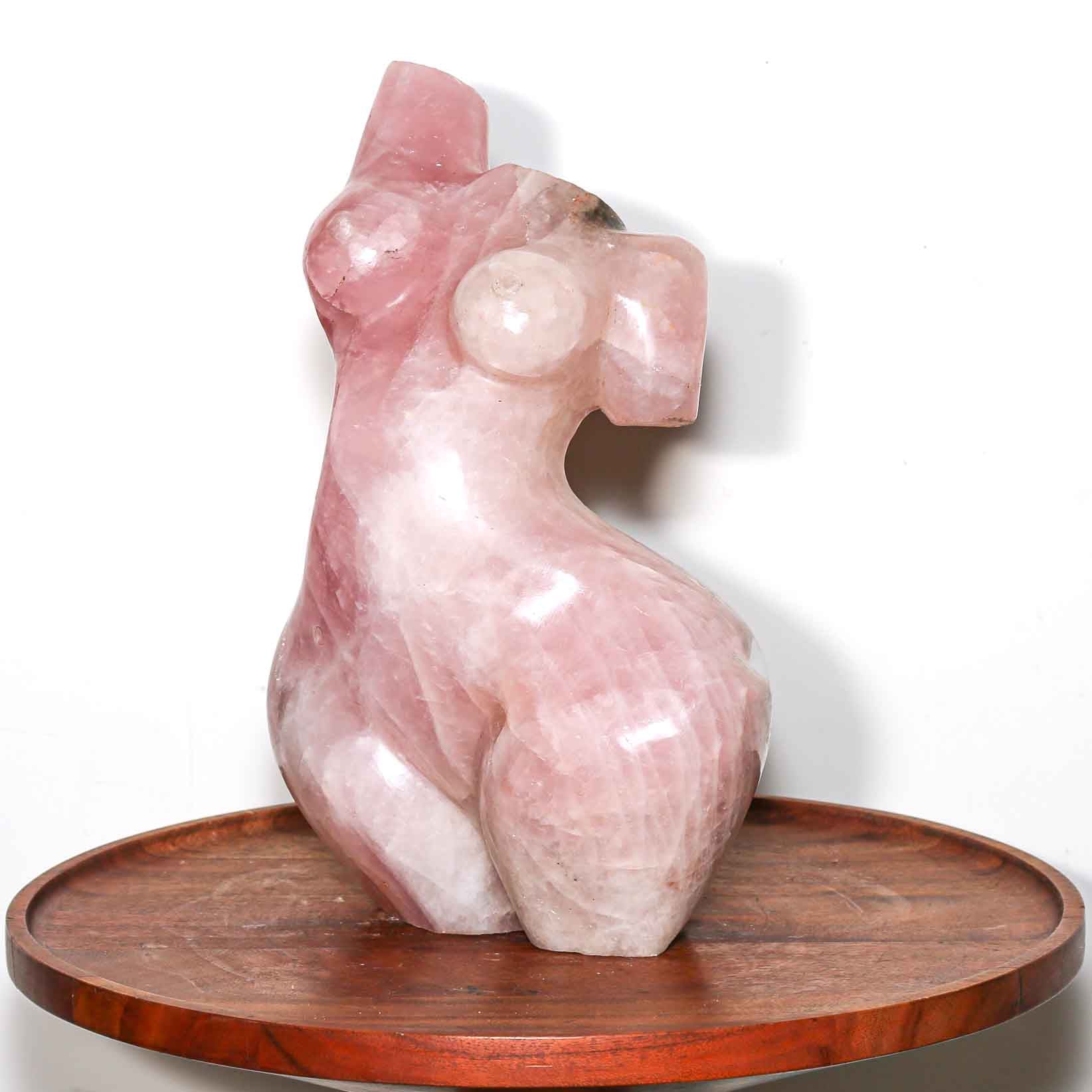 pink sculpture of a woman