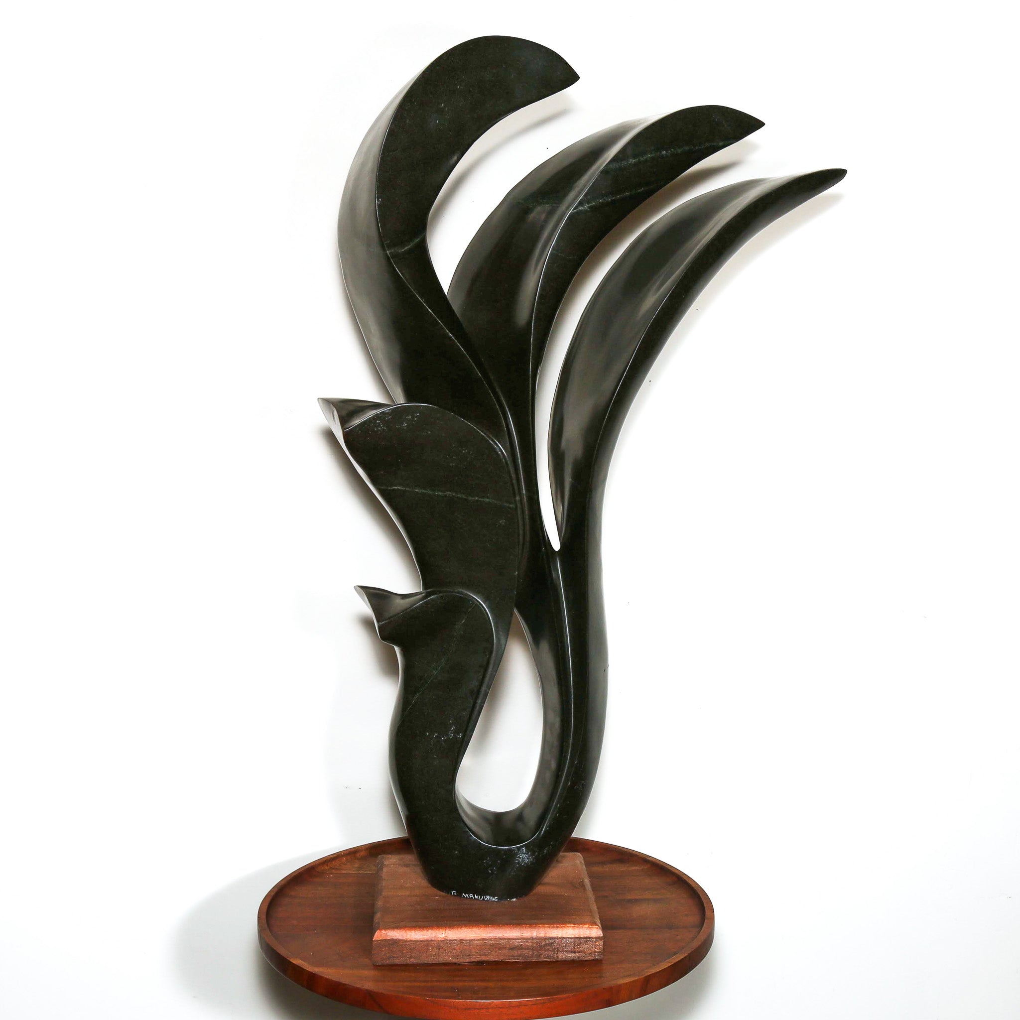 signed modern african sculpture