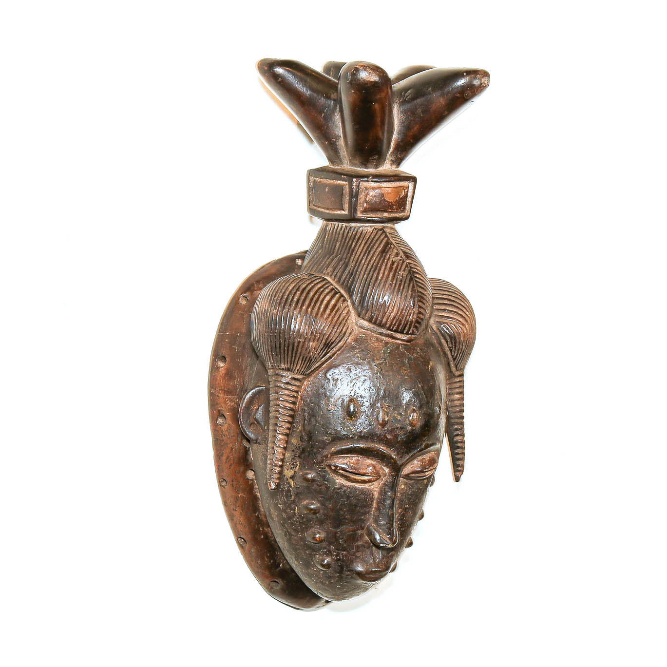 Traditional West African Baule mask with carved headdress
