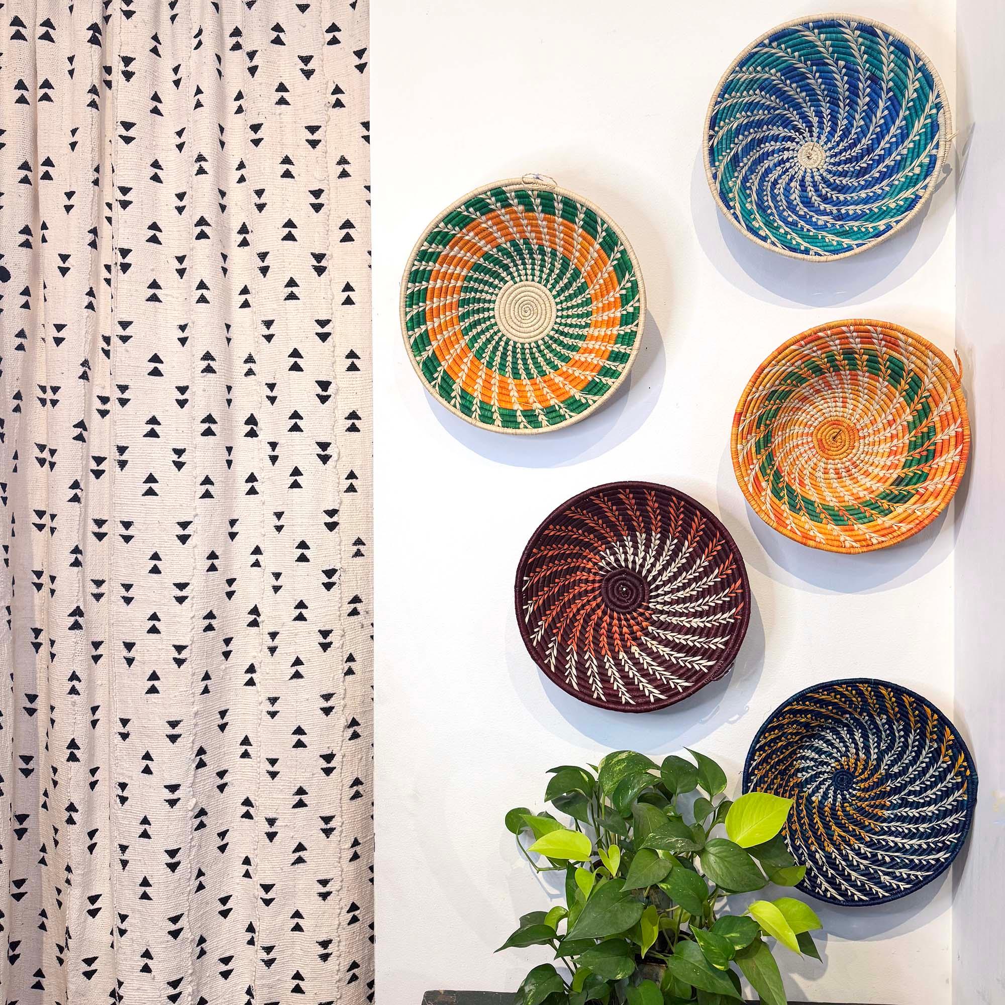 Colorful Woven Baskets from Uganda as a wall decor ideas