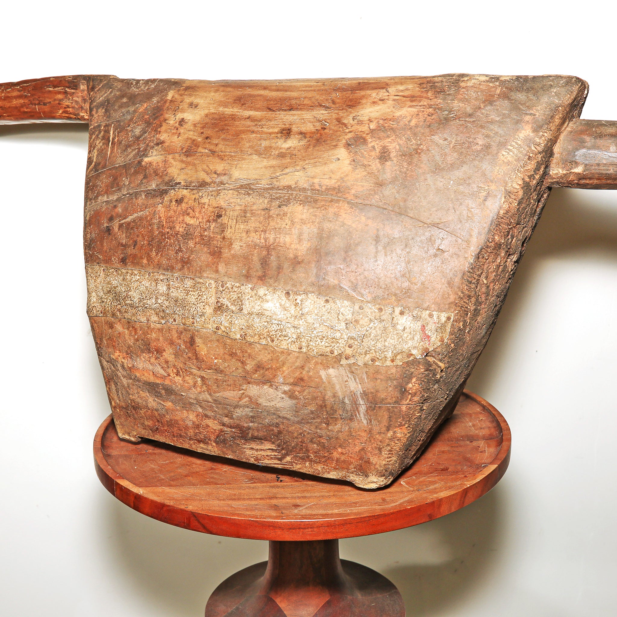 African wooden slit drum combining sculpture and musical function