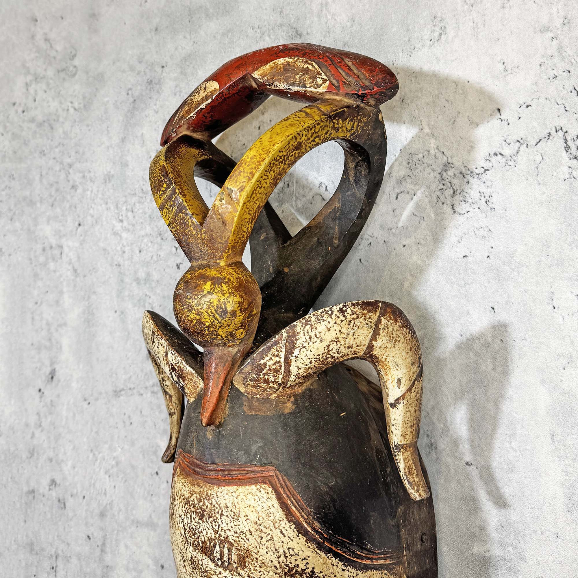 Close up of Guro Mask from Côte d'Ivoire hanging on a wall as a decoration