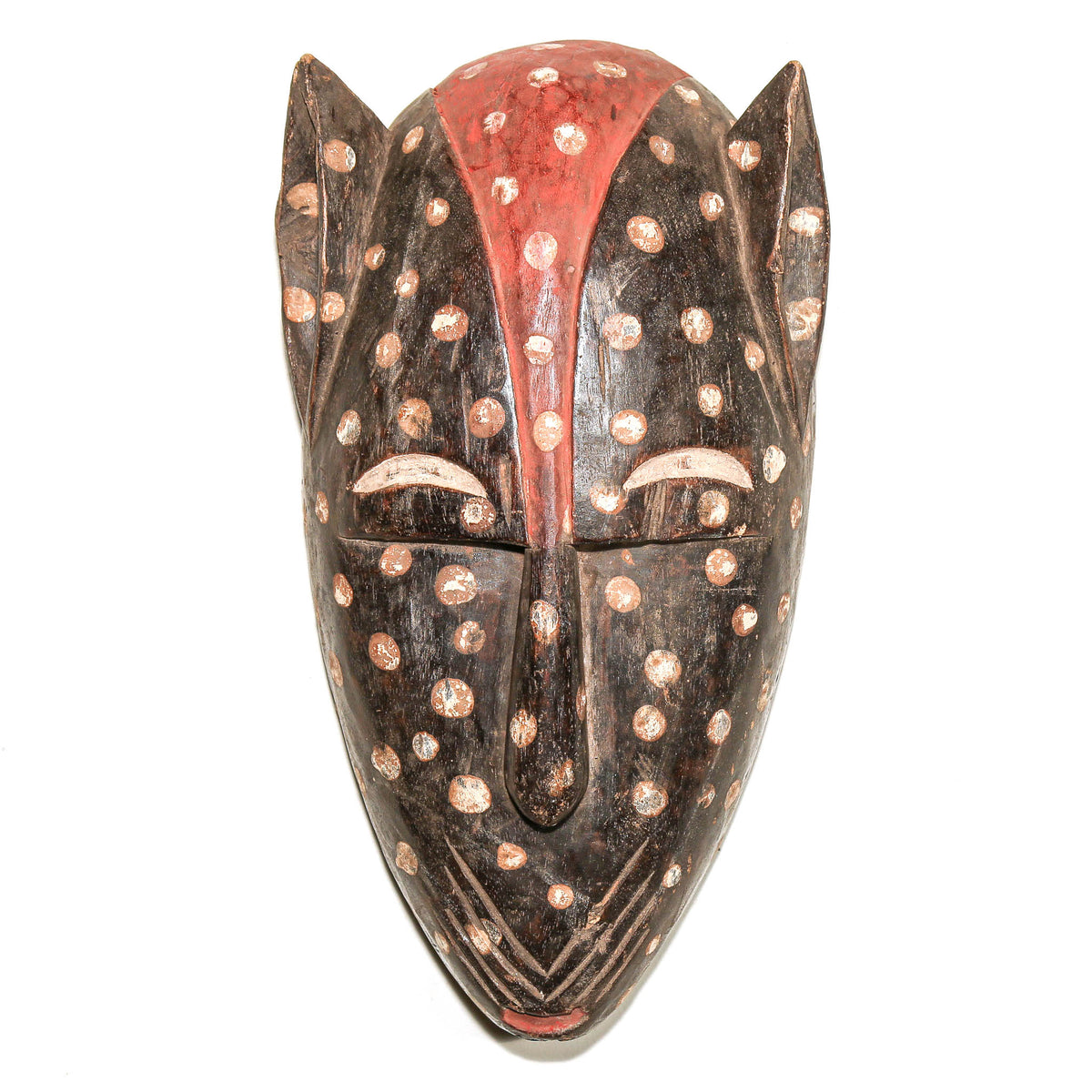 Bamana cat mask from Mali with stylized feline features and traditional hand-carved West African sculptural design