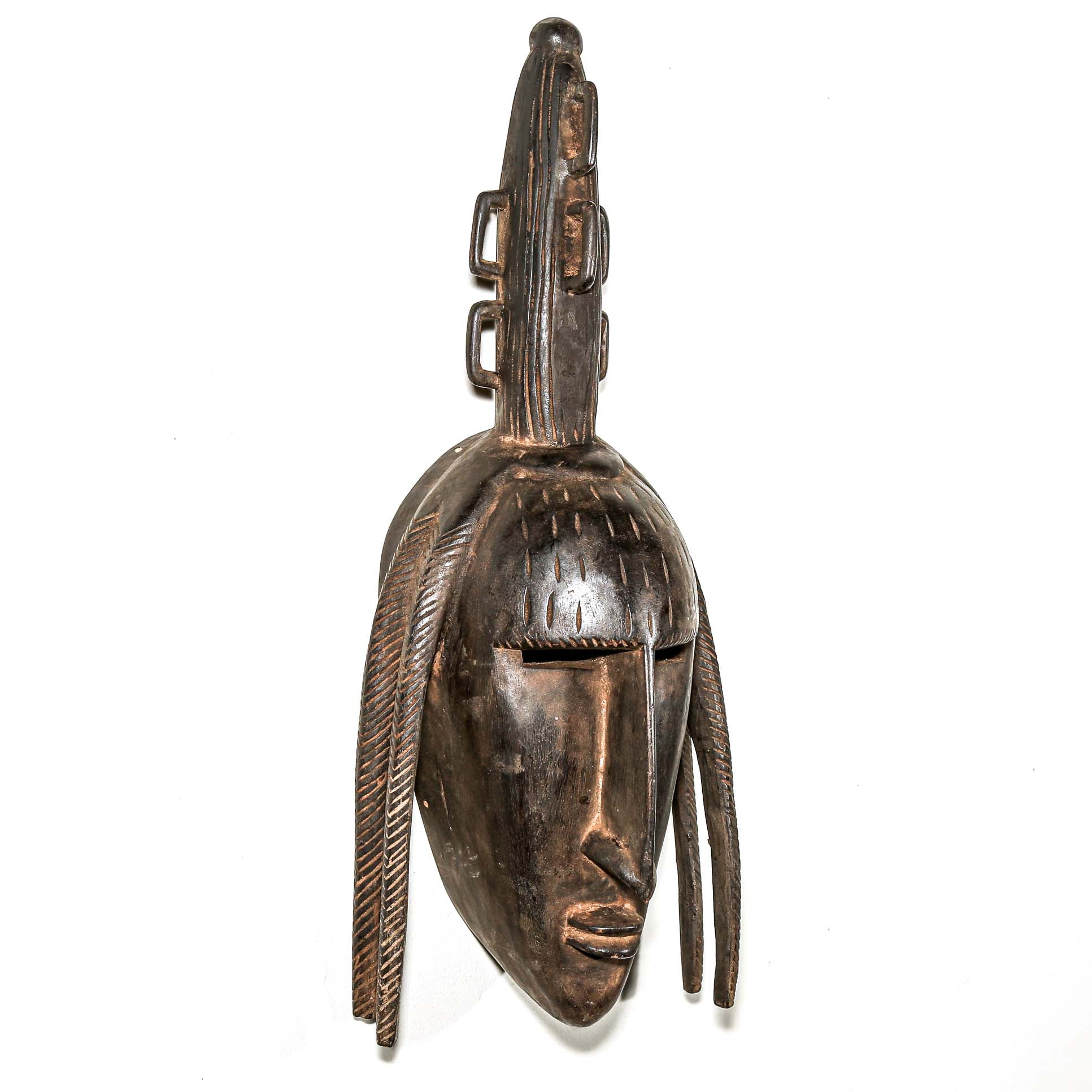 finely carved wooden modern african wall mask. Home and living room decor to hang on the wall