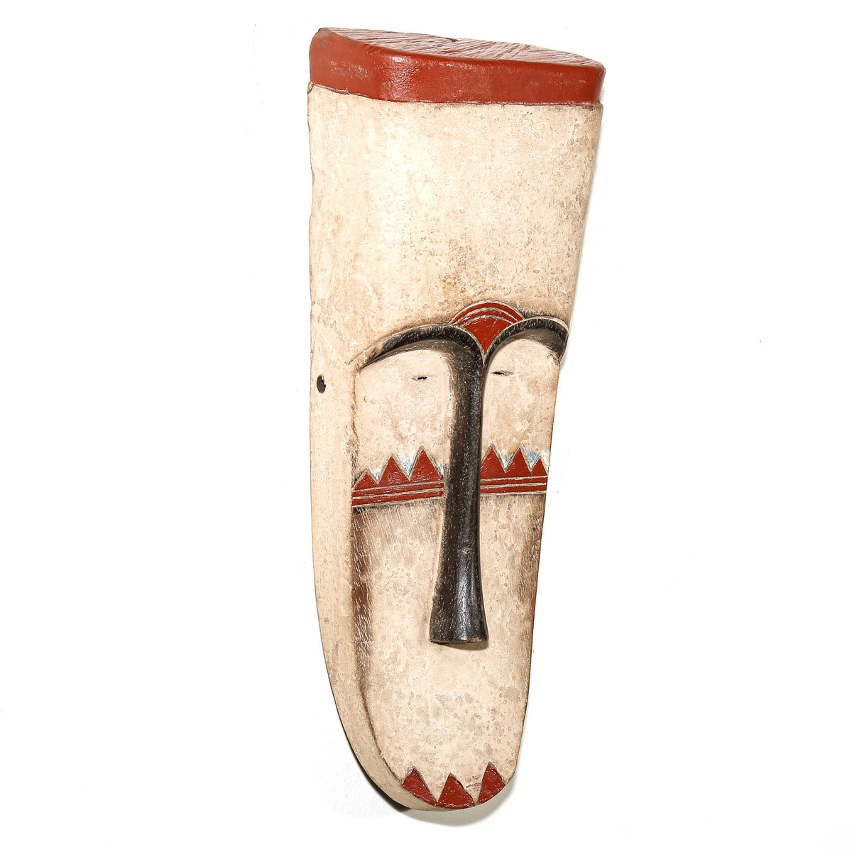 Hand-carved Fang African mask from Gabon featuring a long face, sculptural form, and traditional styling