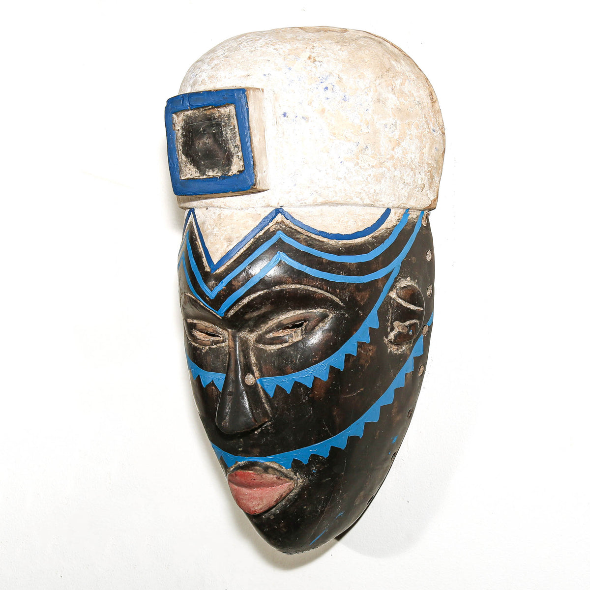 Nigerian Igbo face mask with carved wood construction, strong proportions, and collectible African tribal art character