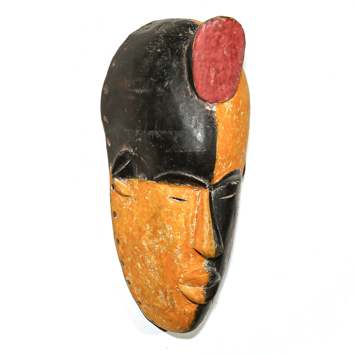 Hand-carved Igbo African mask from Nigeria featuring bold facial details and traditional ceremonial styling