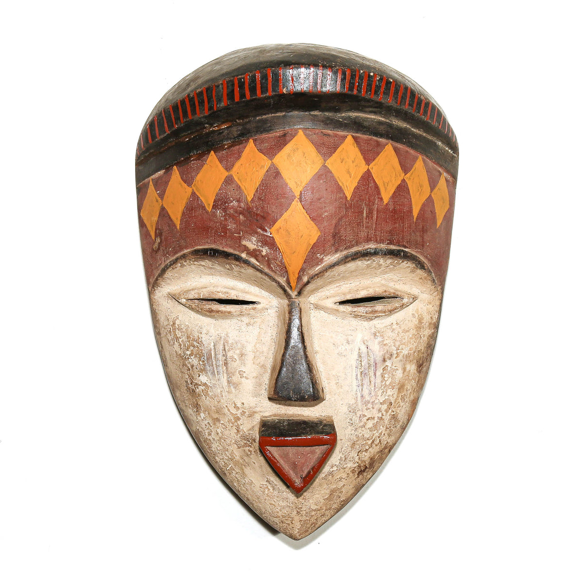 Traditional Pende mask from the Democratic Republic of Congo with finely carved facial features and sculptural form