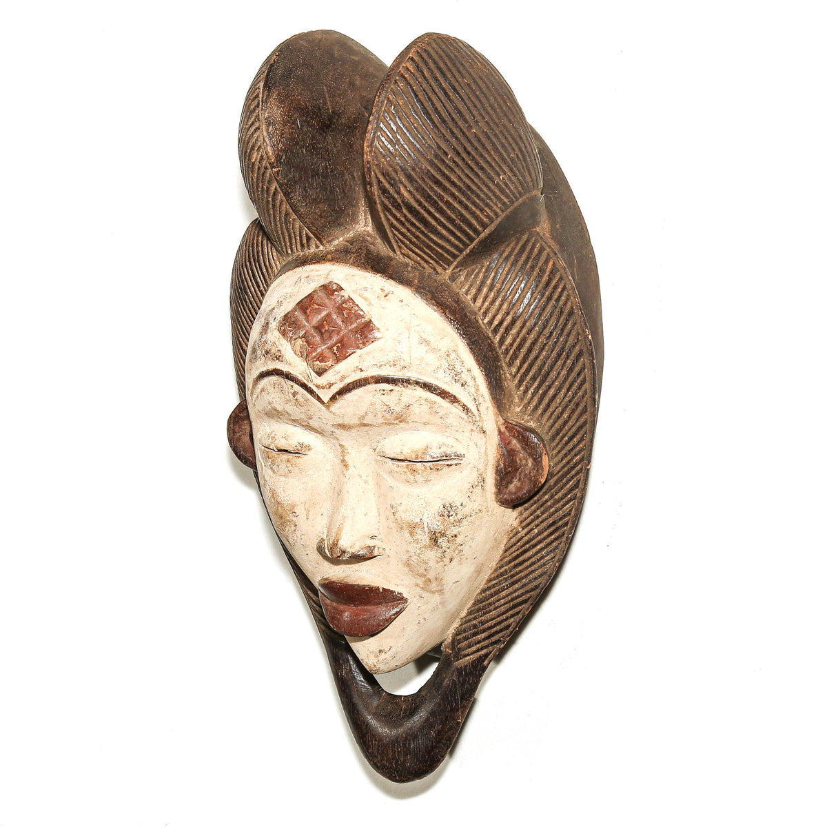 Gabonese Punu face mask with sculptural carved wood form, displayed as collectible African tribal art