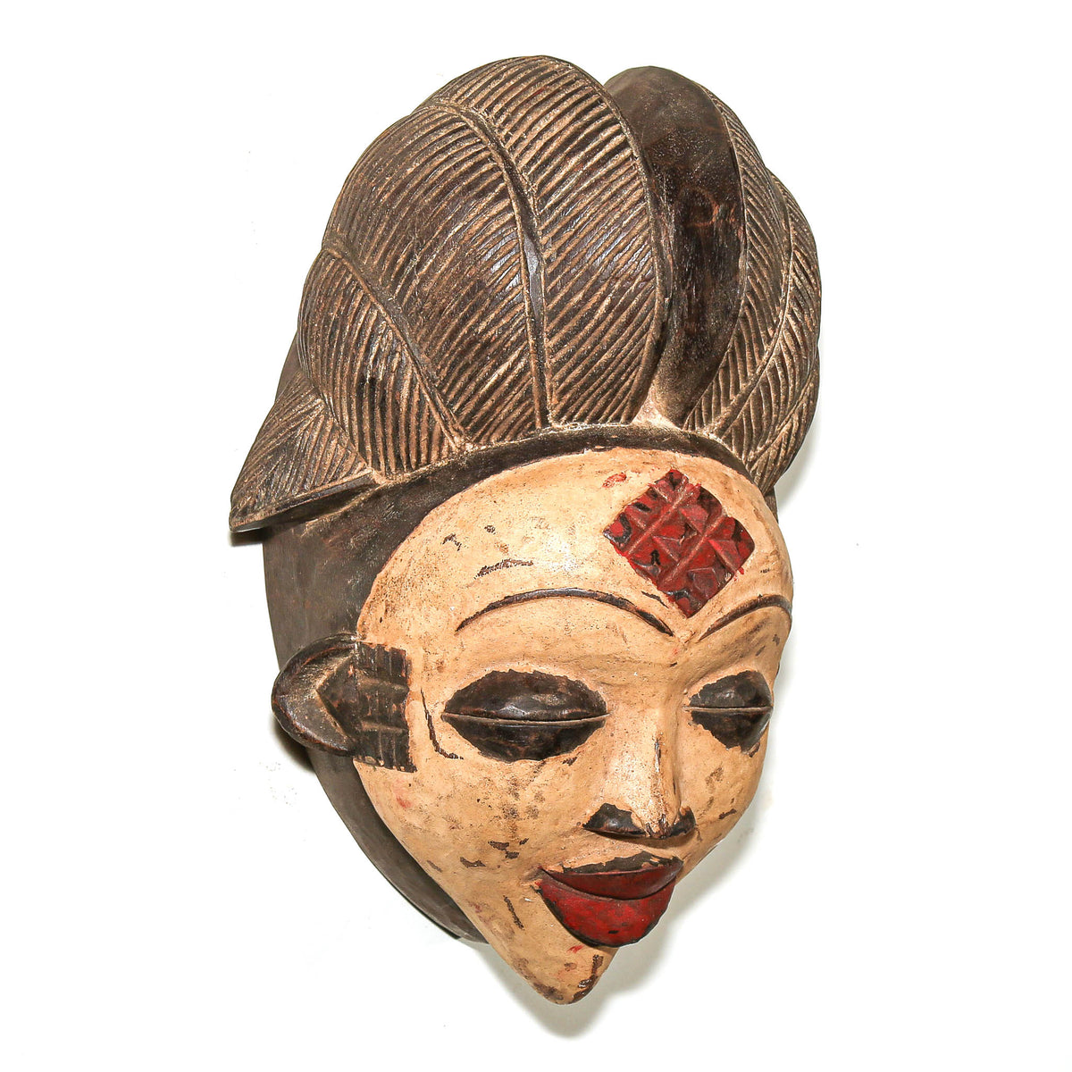 Traditional large Punu mask from Gabon displayed as collectible African tribal art with finely carved facial details