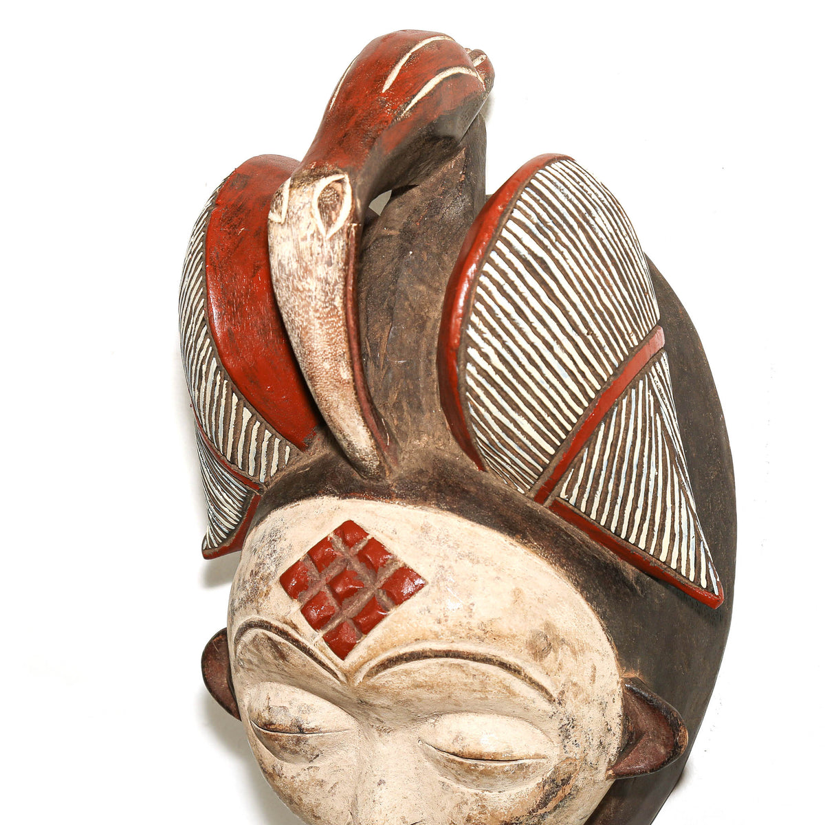 Traditional large Punu ceremonial mask from Gabon with carved wood construction and distinctive regional styling