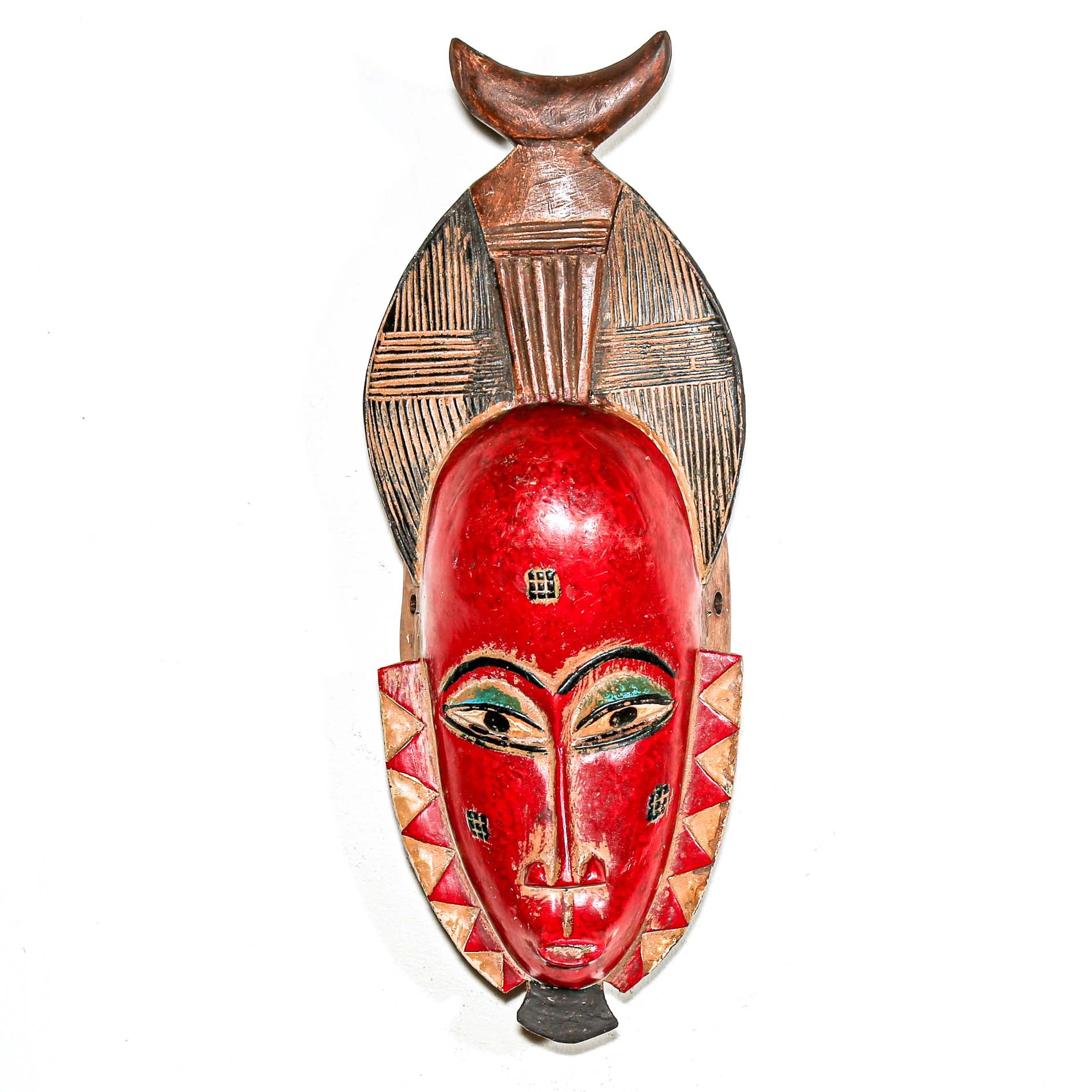 African-style wooden mask with a red face and brown top on a white background