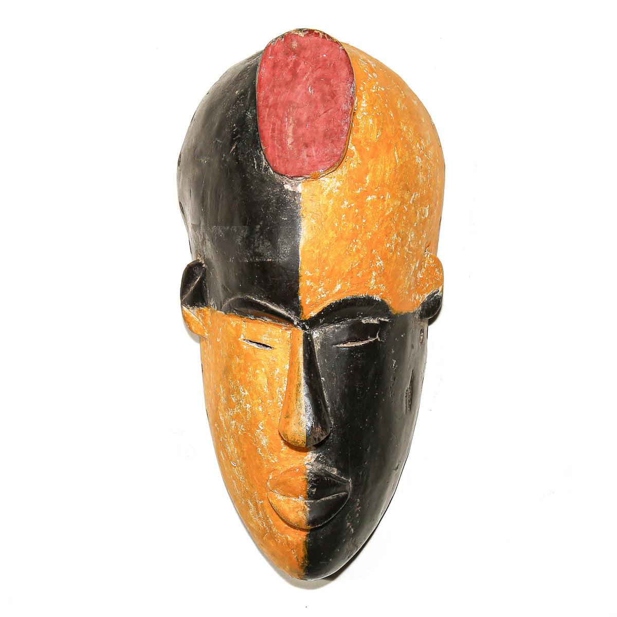 Igbo ceremonial mask from Nigeria with sculptural facial features and traditional regional design from West Africa