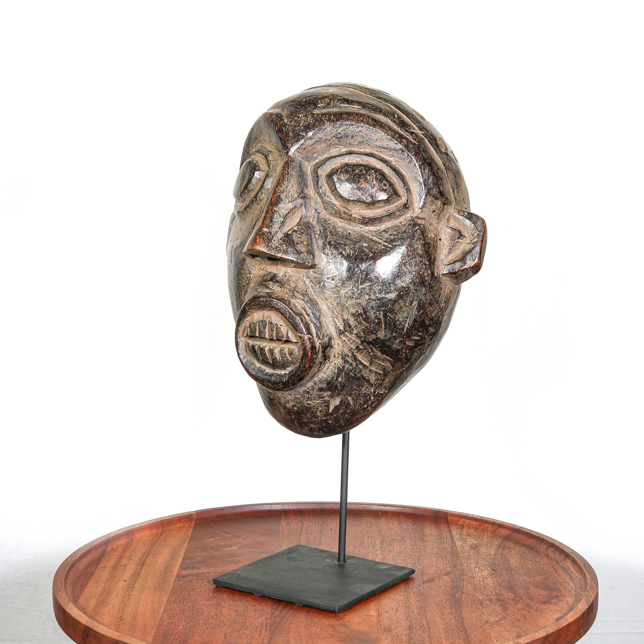 Night Society Bamaleki Mask, Cameroon right on a stand 