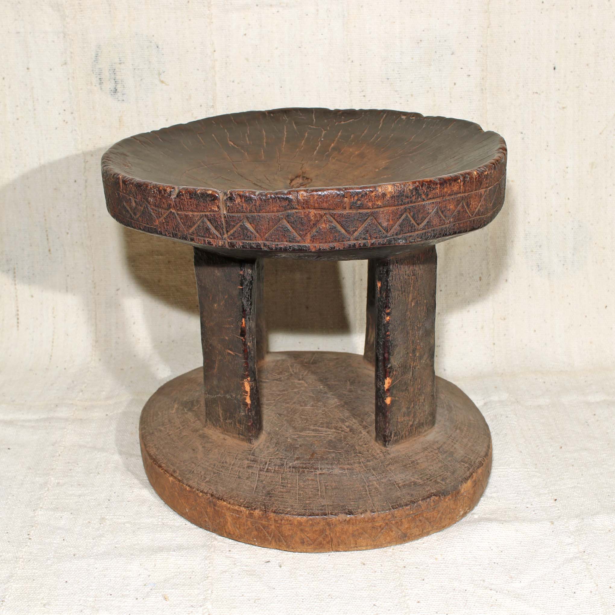 Carved wooden stool