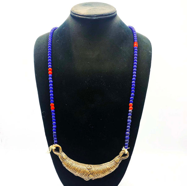 Metal antique jewelry from Africa with blue beaded chain