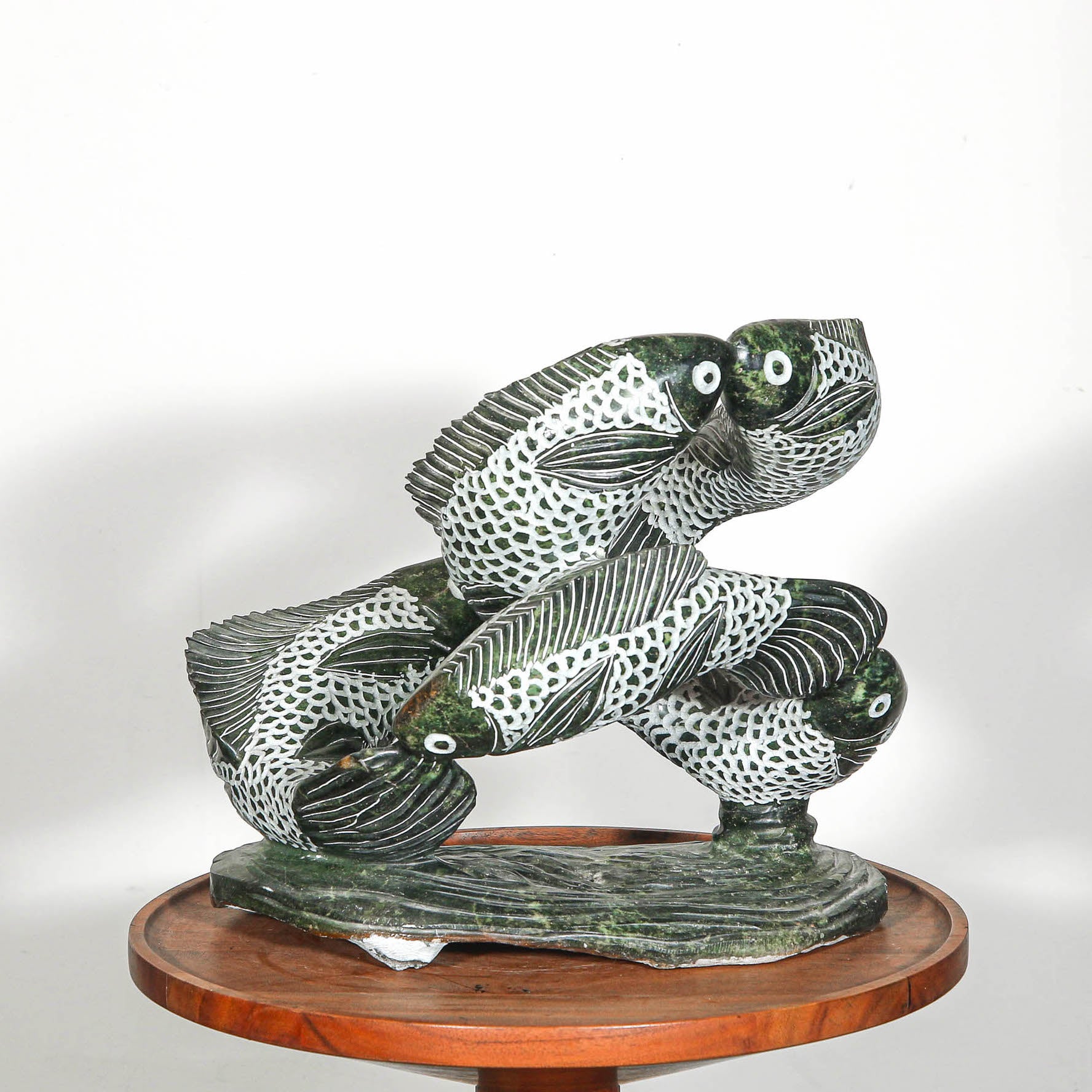 Swimming fish sculpture for outdoor design