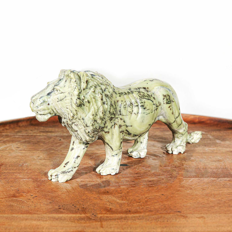 Small hand carvings of lions from Africa Shumba Lion Sculptures